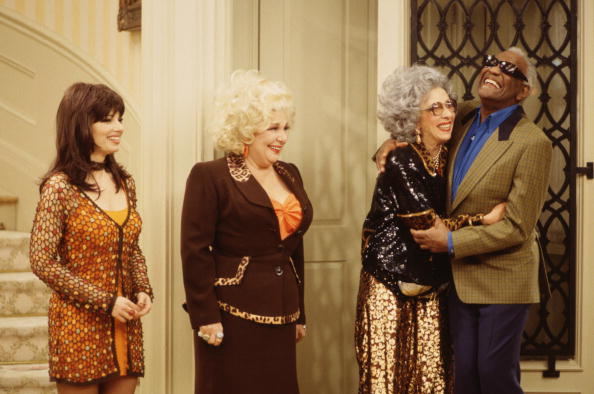 Yetta gives Sammy Portnoy, portrayed by American singer Ray Charles (1930 - 2004), a hug in a scene from 'The Nanny' episode 'Fair Weather Fran,' Los Angeles, California, November 6, 1997. L-R: American actresses Fran Drescher (as Fran Fine), Renee Taylor (as Sylvia Fine), Ann Morgan Guilbert (as Yetta Rosenberg) and Charles. (Photo by CBS Photo Archive/Getty Images)