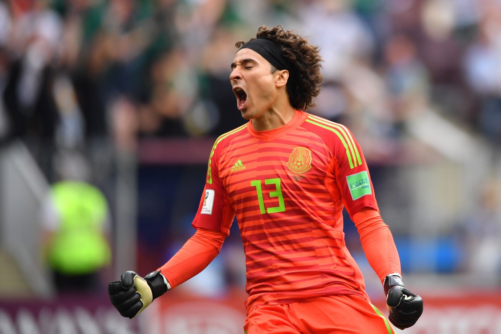 MOSCOW, RUSSIA - JUNE 17: Guillermo Ochoa of Mexico celebrates after his team mate Hirving Lozano scores the first goal during the 2018 FIFA World Cup Russia group F match between Germany and Mexico at Luzhniki Stadium on June 17, 2018 in Moscow, Russia. (Photo by Hector Vivas/Getty Images)